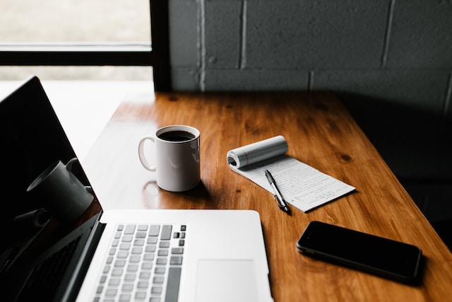 Cup of Coffee and Laptop