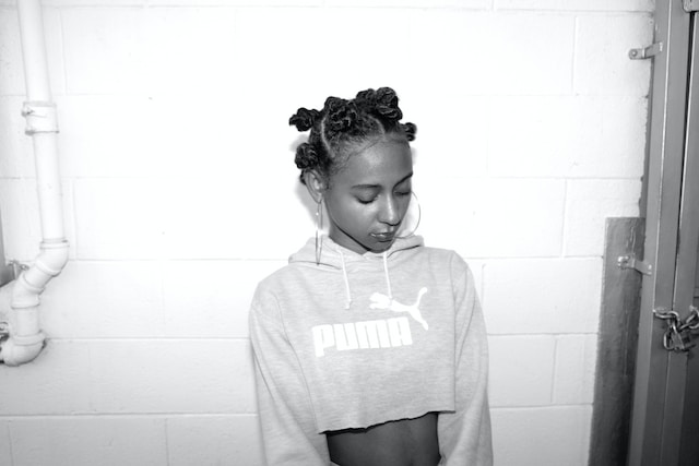 Black Girl in Puma Tracksuit Top
