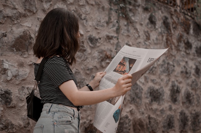 Woman Reading Newspaper