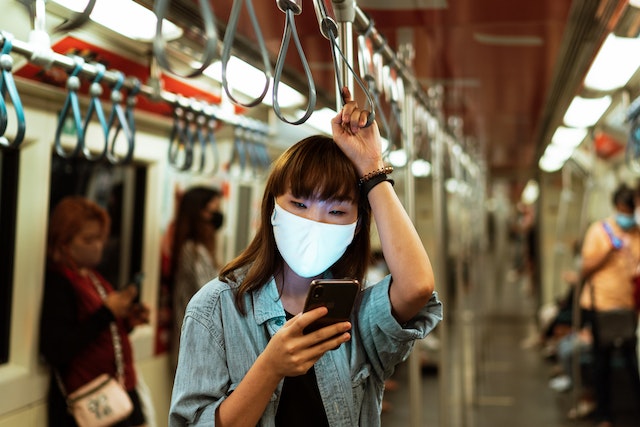 Woman Looking At Her Phone - Is Email Marketing Still Effective