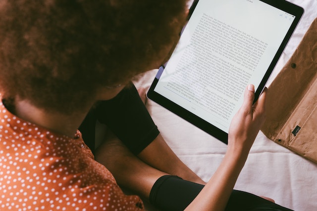Black Woman Reading - How To Write an eBook